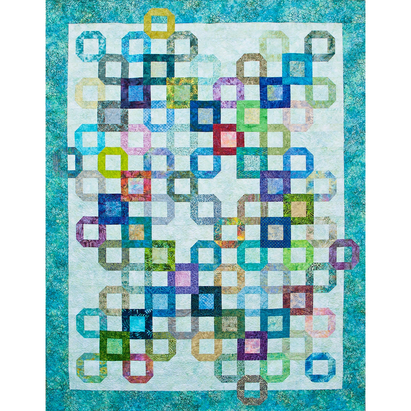 Fun quilt features open blocks on a neutral background with some with different colors inside them. The design of where the blocks are placed seems random.
