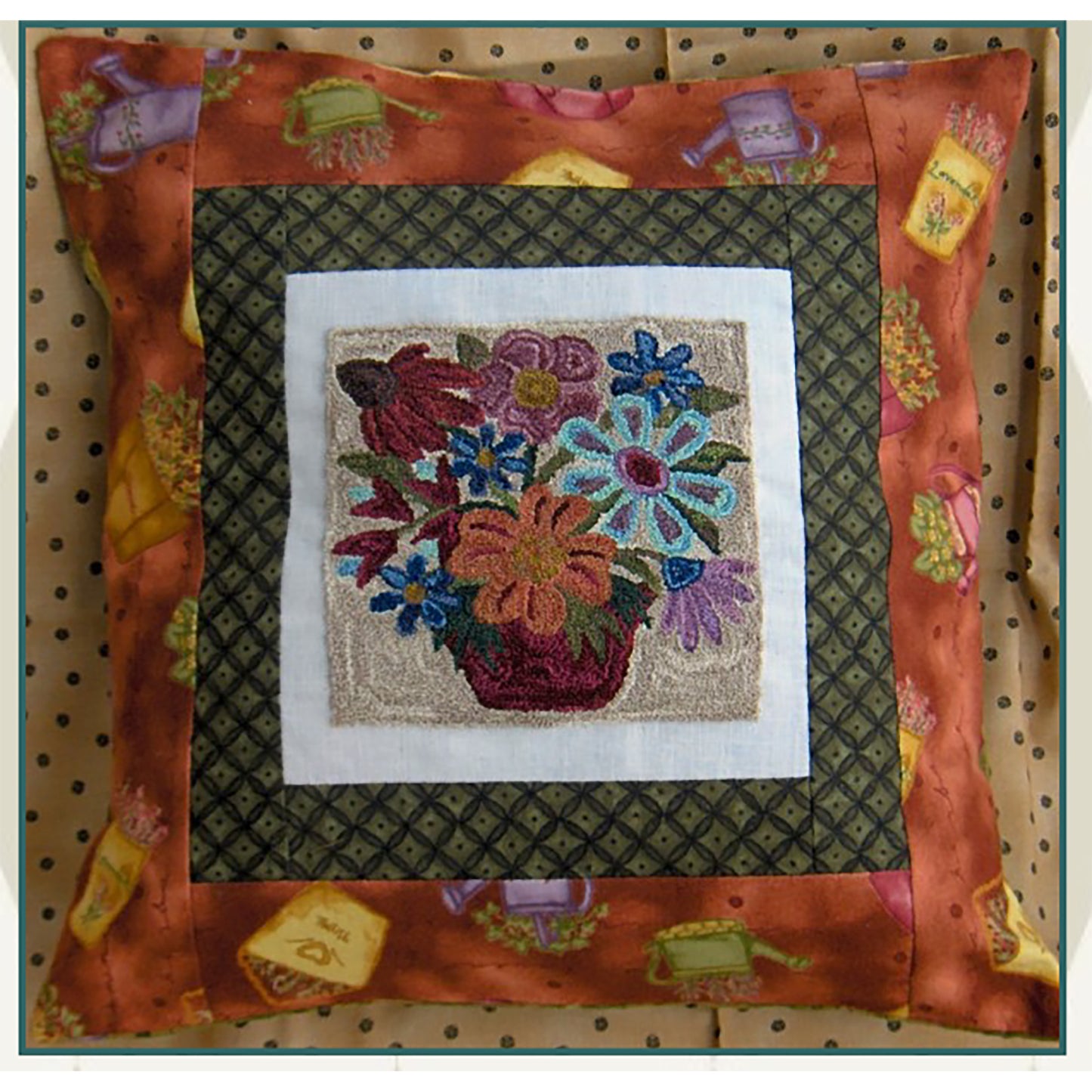 Pretty block showcases beautiful punch needle embroidery flowers in a pot block.