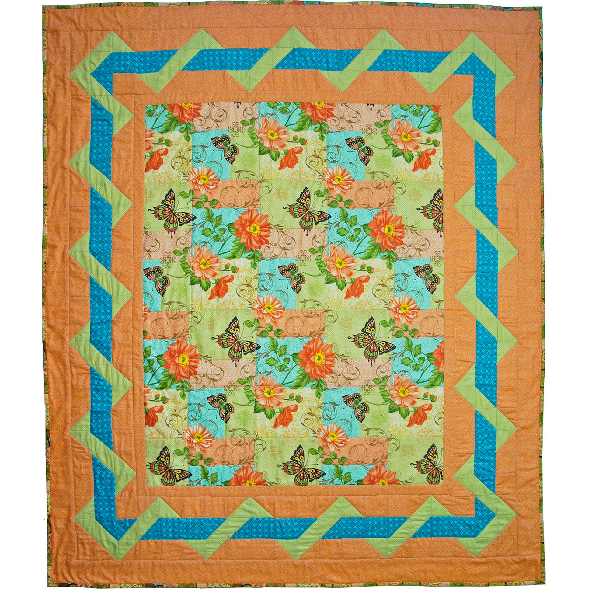 Quilt with butterfly and floral pattern on a white background