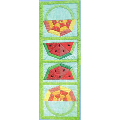 Adorable table runner features watermelons in the middle facing both sides and a patchwork basket with handle.  Perfect picnic table runner.