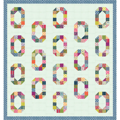 Fun circles of colorful fabric on this quilt.