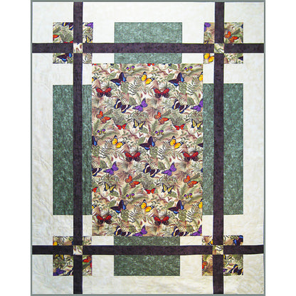 Quilt with butterfly pattern and geometric design on a white background