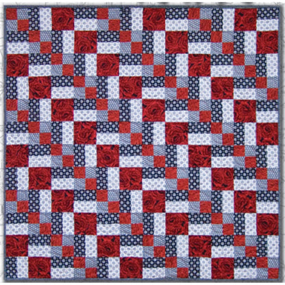 Three color quilt in red, white, and blue features a row of diamonds at a diagonal.  Really pretty and patriotic feeling.