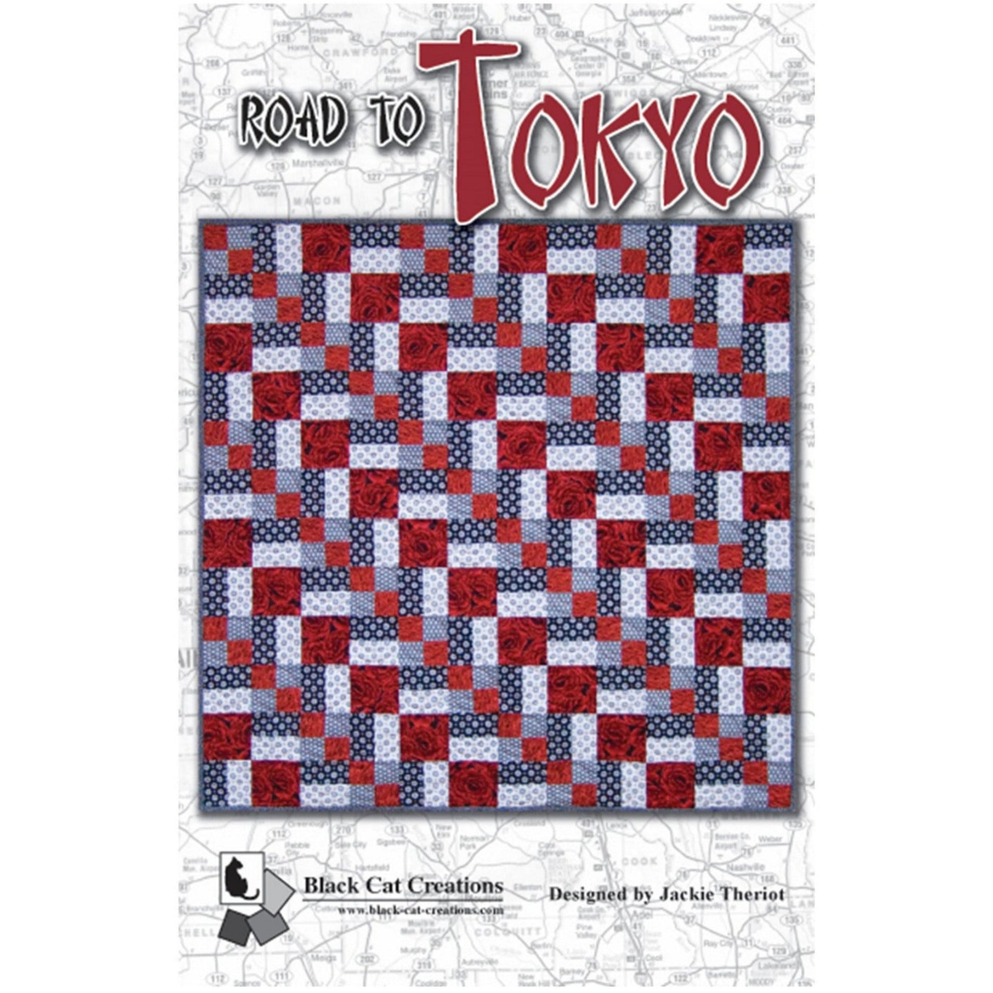 Quilt with red, white, and blue pattern on a white background with 'Road to Tokyo' text.