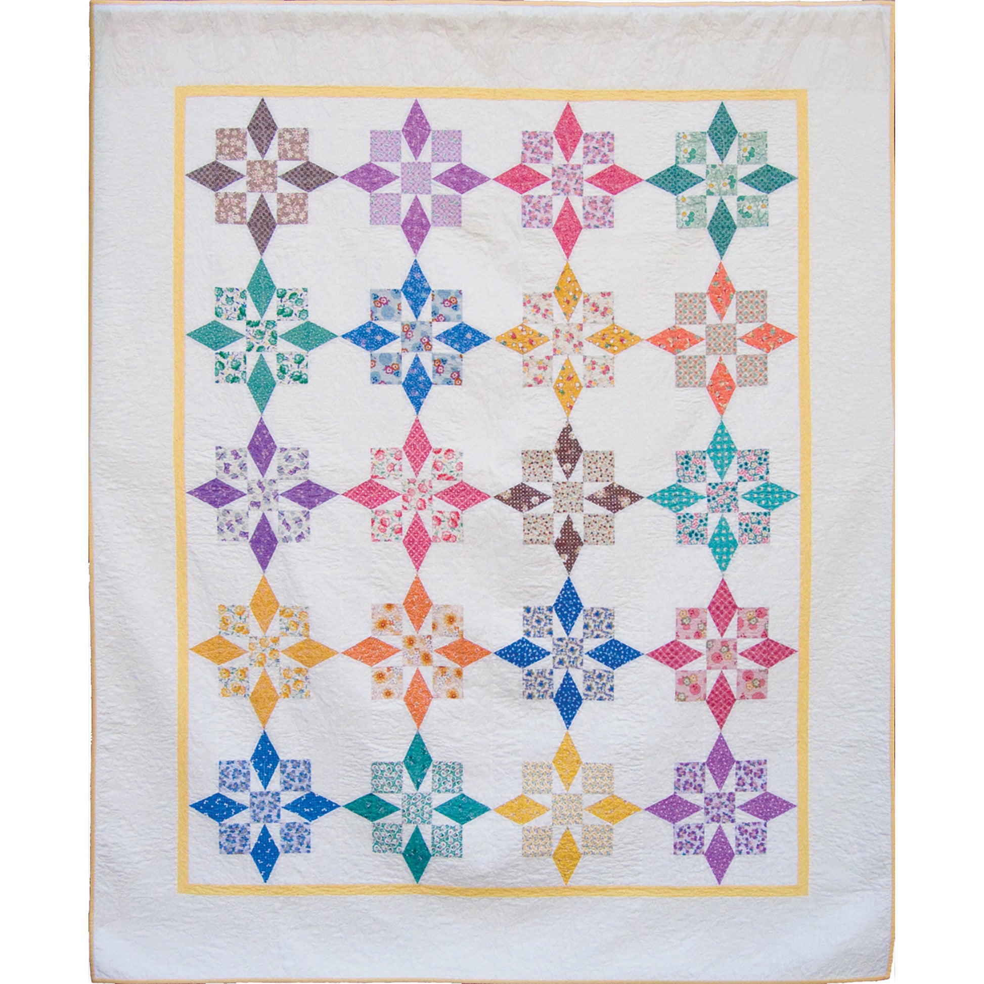 County Fair quilt is a new quilt with that old time look and feel. Fun stars in bright and fun colors parade across the white background fabric.