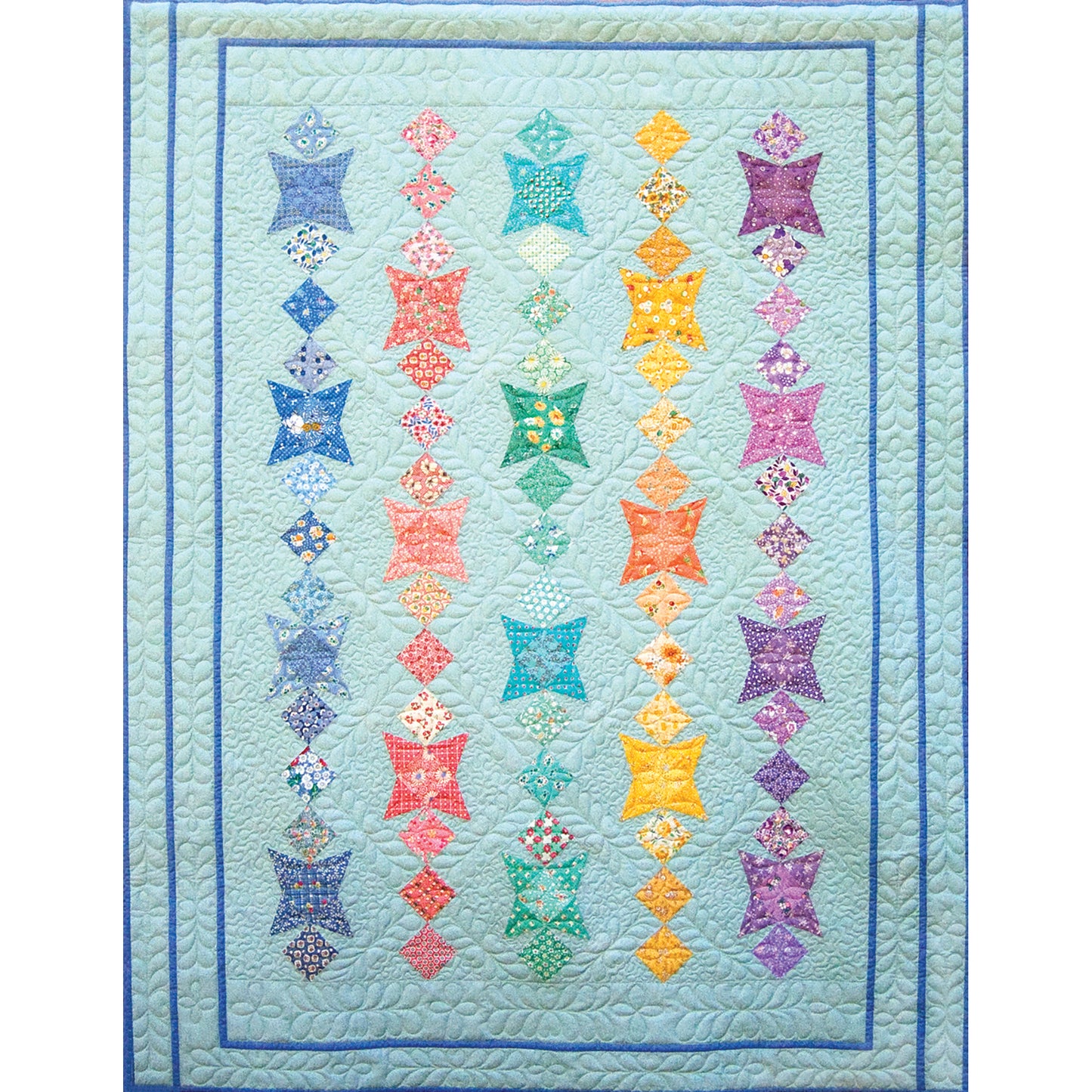Fun quilt features rows of colorful fabrics. Each row includes a star, and diamonds of fun fabric in similar colors.  Almost like rows of necklaces.