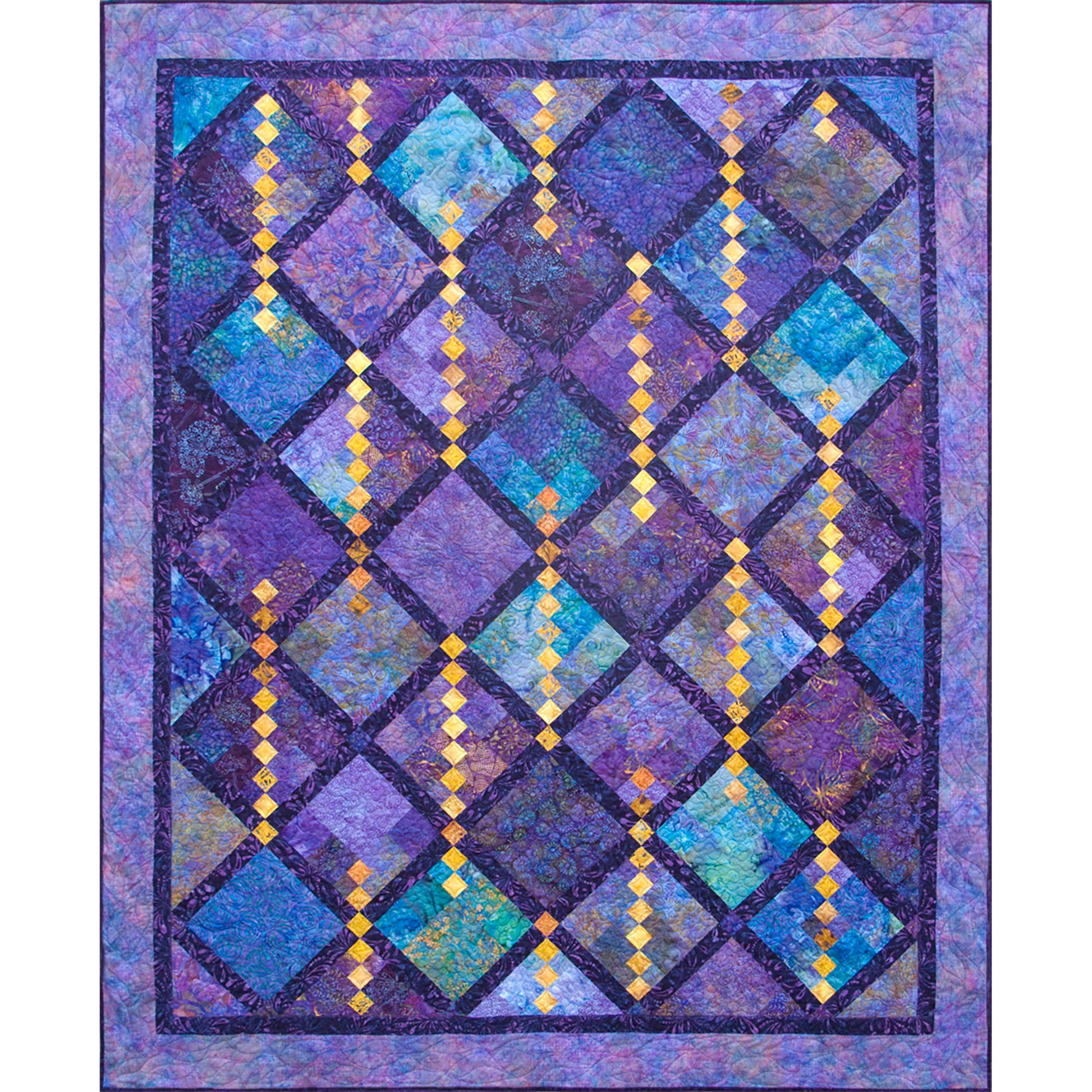 Fun quilt features diamonds with rows of dripping gold diamonds.