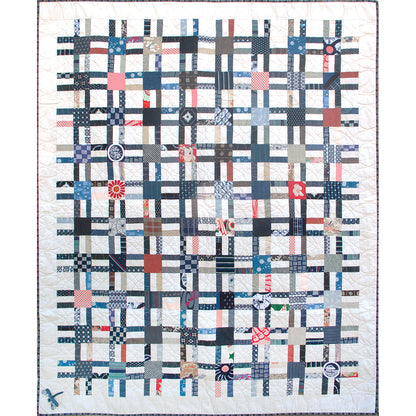 Fun double, crossing stripes quilt with colorful blocks on some of the created blocks.