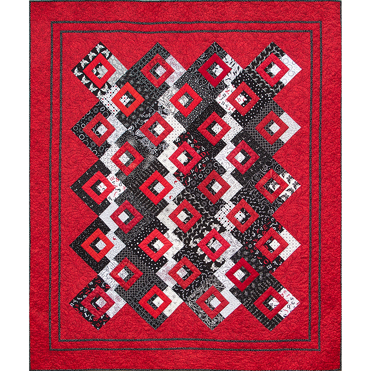 Bright quilt features red background and popping red diamonds on a black and white fabric middle of rows of diamonds.