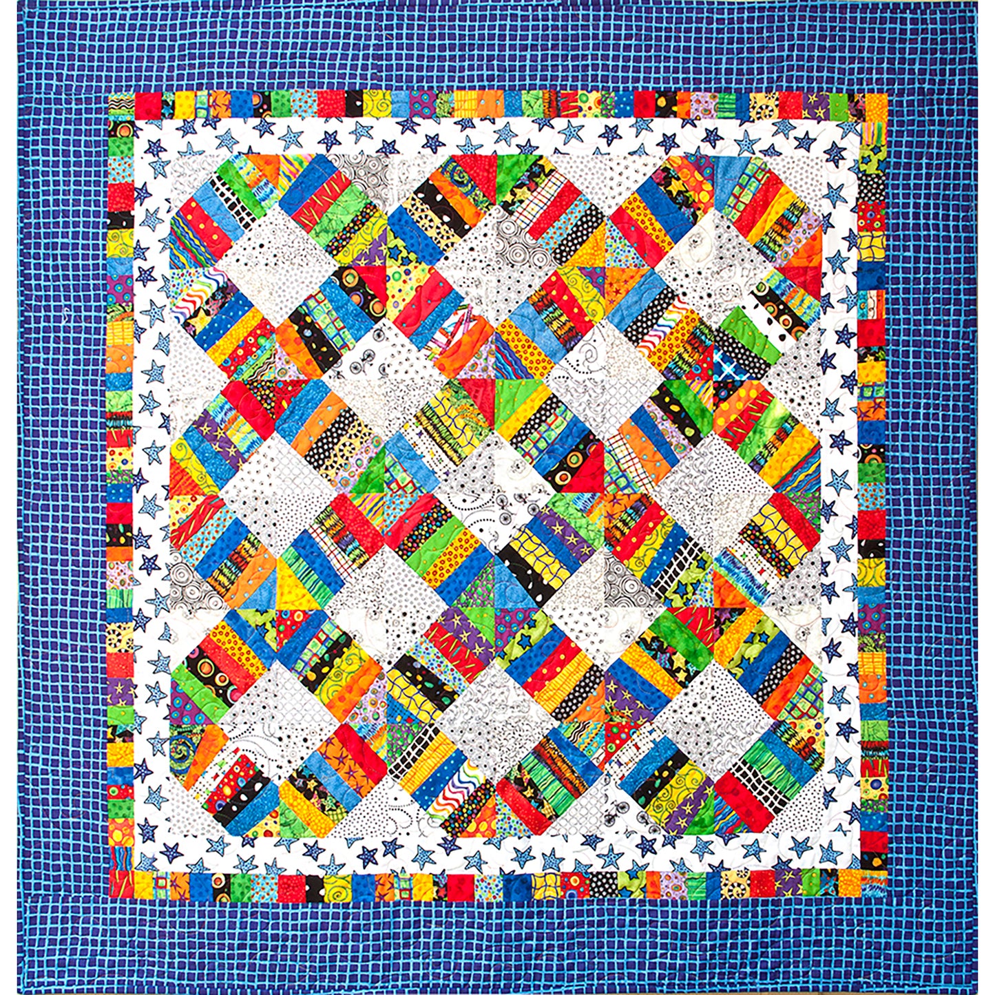 Fun interweaving circles of scrappy fabric quilt.