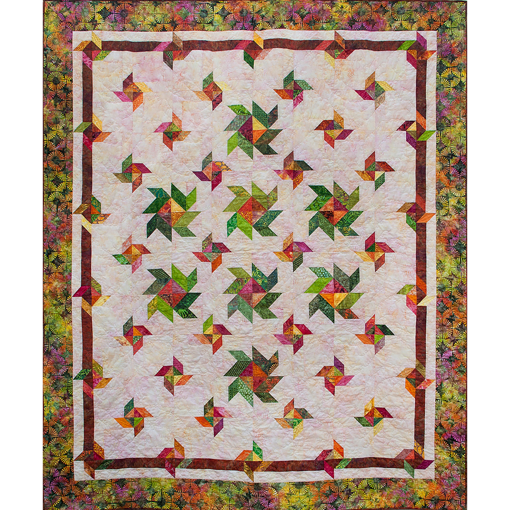 Wingdings quilt is a fun spattering of different sized pinwheel like flowers across a neutral backgroun fabric.