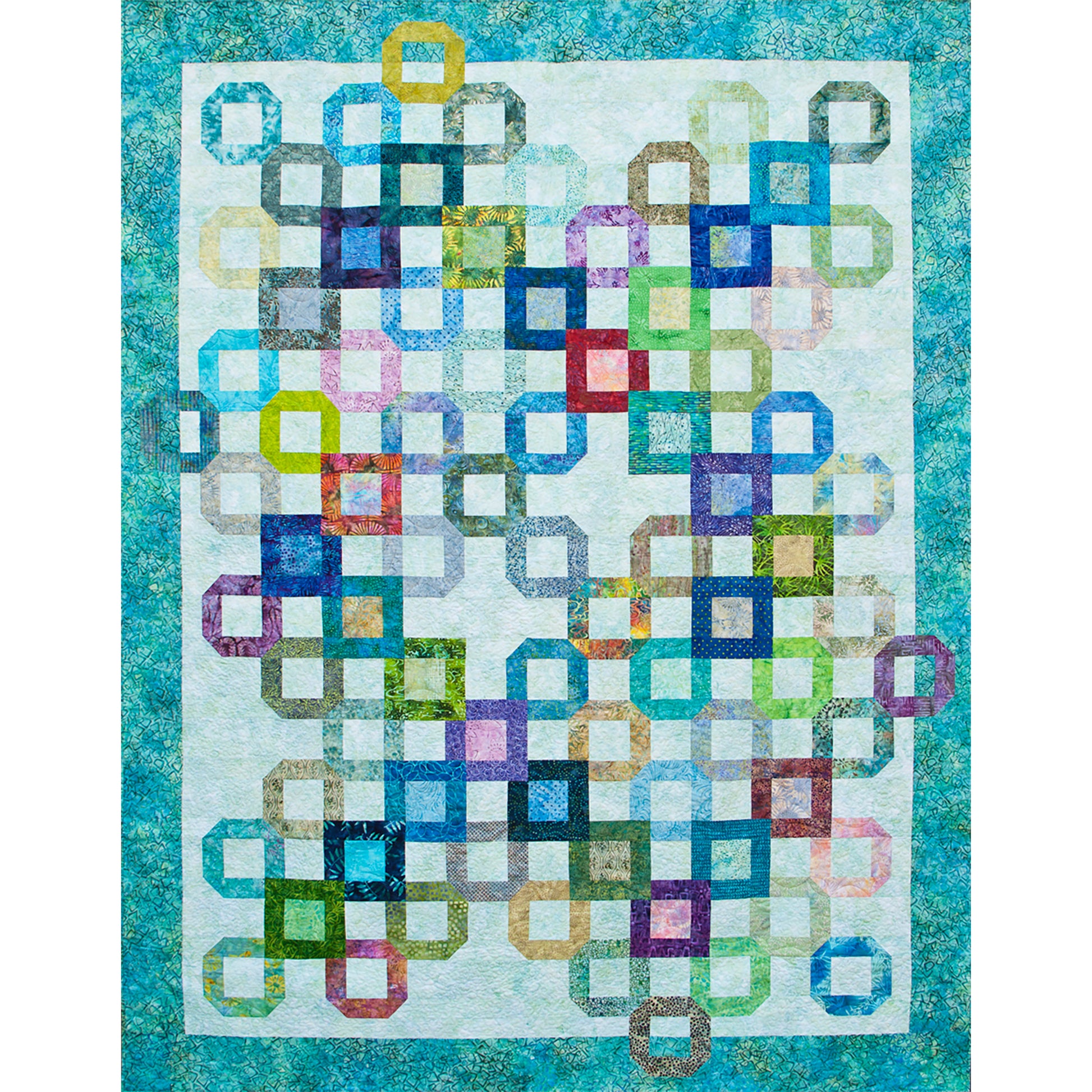 Fun quilt features open blocks on a neutral background with some with different colors inside them. The design of where the blocks are placed seems random.