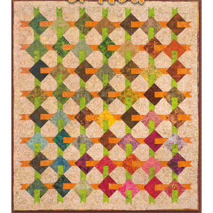 Fun quilt features diamonds that appear to be woven through from top and bottom in green and left to right in orange.