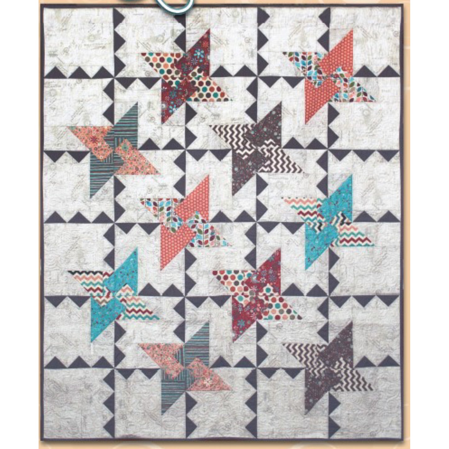 Quilt features colorful friendship stars and blocks surrounded by triangles.
