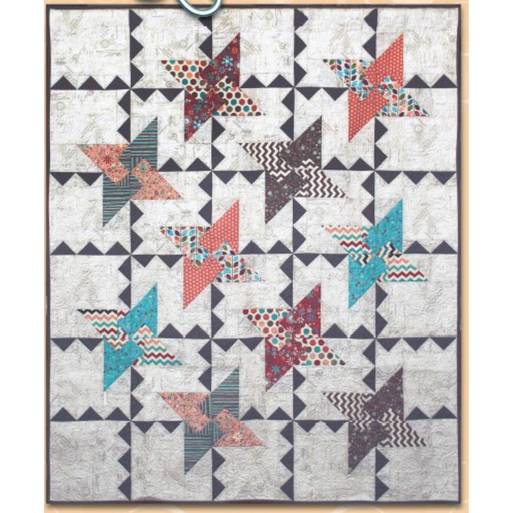 Quilt features colorful friendship stars and blocks surrounded by triangles.