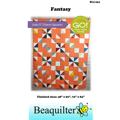 Charming quilt in peach with diamonds and squares design with note about this pattern being Accuquilt GO! fabric cutter friendly and that it uses 5-inch charm squares.