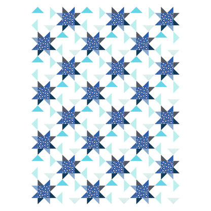 A blue and white quilt featuring a star pattern. 