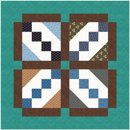 A blue and brown quilt featuring a pattern of squares with smaller blocks at an angle in each square. The finished look gives the feel of  Xs with brown fabric between each block for a total of 4 blocks.