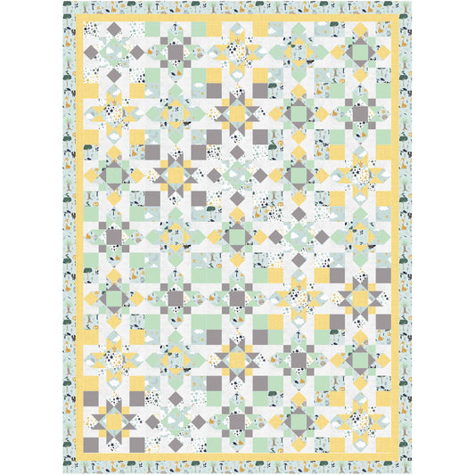 A yellow and gray quilt featuring a green and white design of different stars and 4-patch squares.