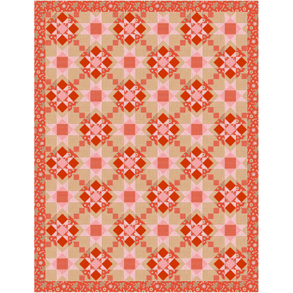 Festive quilt features red fabric with cookies and candy canes. Pieced into blasts of stars and diamond shapes with pink and cream fabrics added.