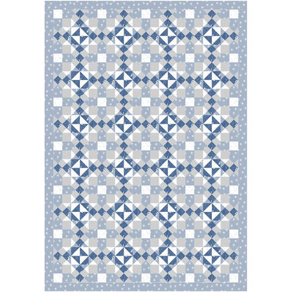 A quilt featuring a pattern of blue, white, and gray squares arranged in a harmonious design.