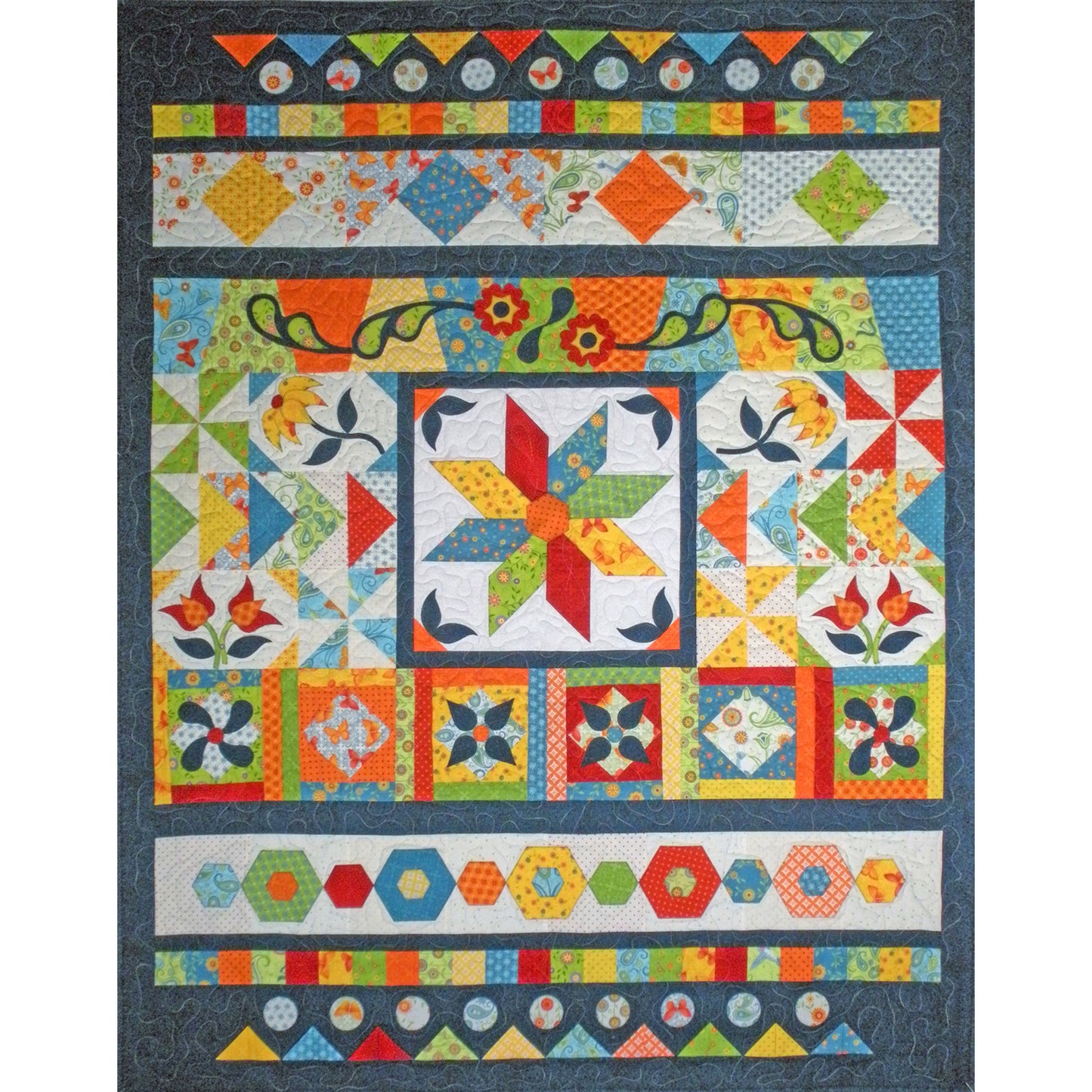 Colorful quilt with geometric and floral patterns on a dark background