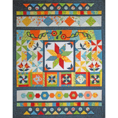 Colorful quilt with geometric and floral patterns on a dark background