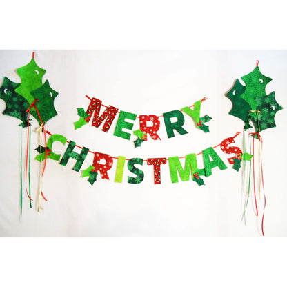 Merry Christmas banner with holly leaves on a white background