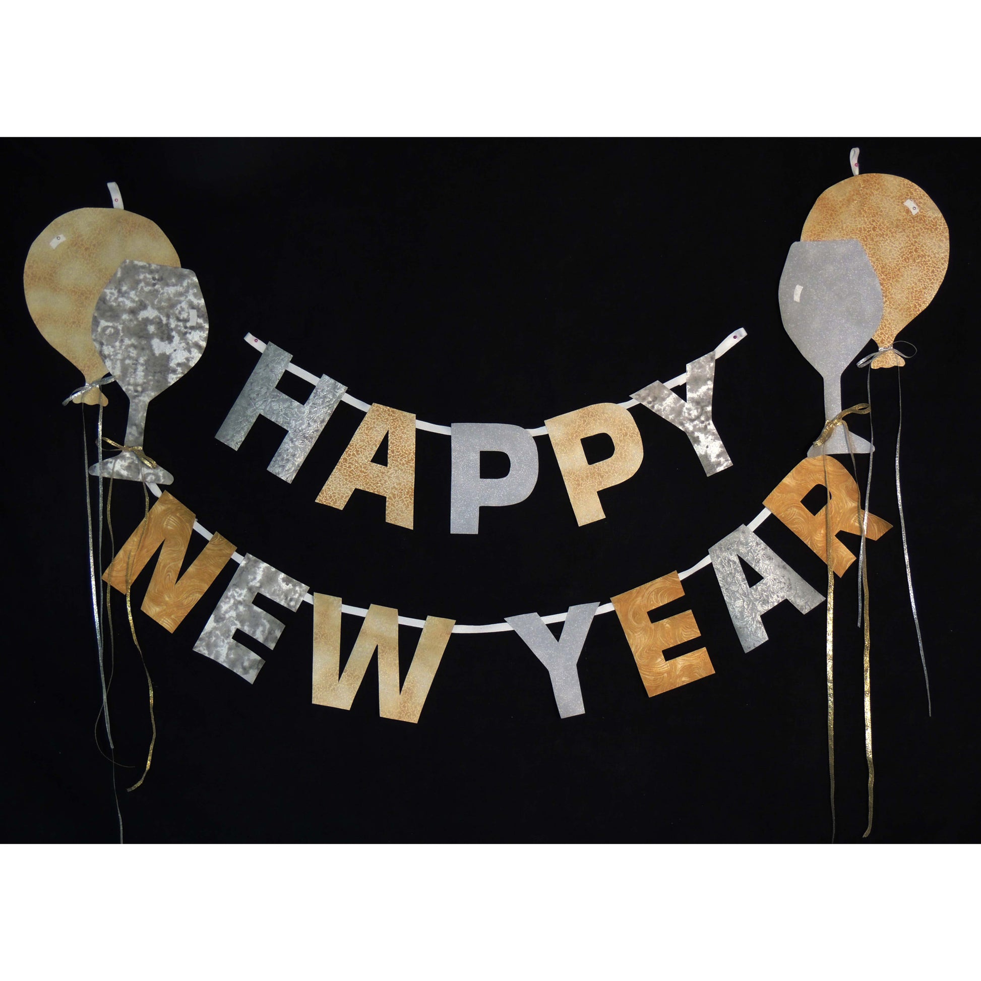 Happy New Year banner with gold, silver, and bronze letters on a black background