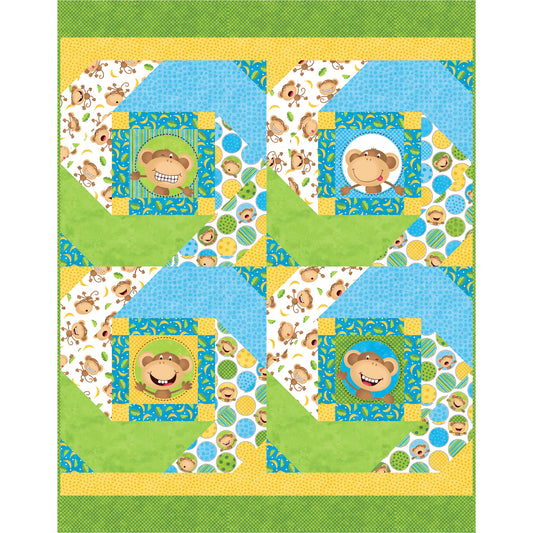 Children's quilt with monkey pattern on a green background