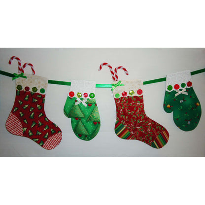 Stockings and Mittens Garland in Christmas fabrics.