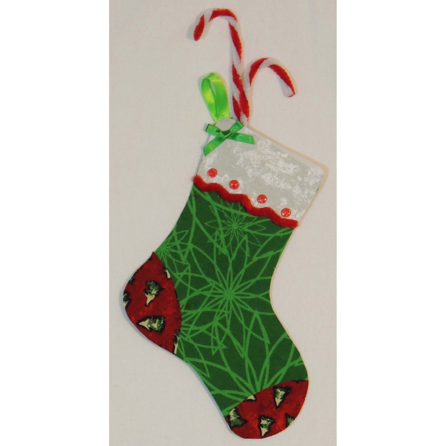 Single stocking from "Stockings and Mittens Garland" in Christmas fabrics.
