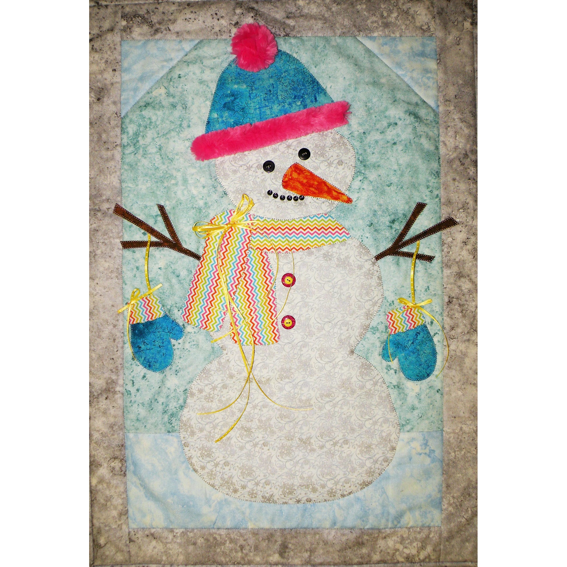 Cute snowman wall hanging with a colorful scarf, hat, carrot nose and mittens hanging from stick arms.