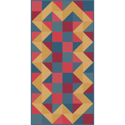 Beautiful quilt features blocks of color with a zig-zag pattern in contrasting pattern on the outside.