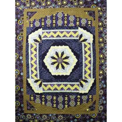 Fun quilt with a flower medallion in the middle.