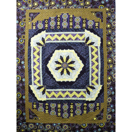 Fun quilt with a flower medallion in the middle.