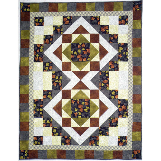Quilt with geometric pattern on a white background