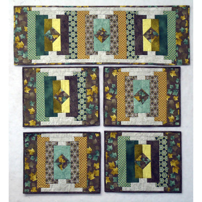 Image of table runner and four matching placemats in fall fabrics.