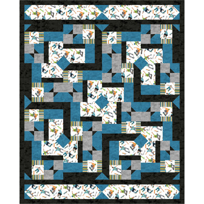 Quilt with geometric pattern in blue, gray, and black on a white background