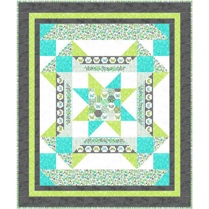 Quilt with star pattern in teal, green, and gray on a white background