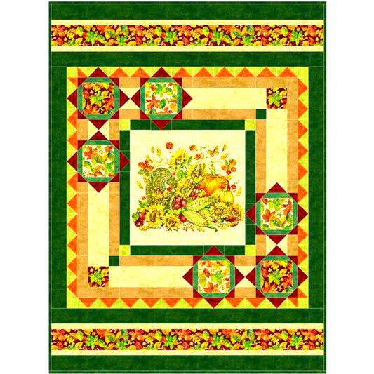 Colorful quilt with autumn-themed design featuring pumpkins and leaves on a green background.