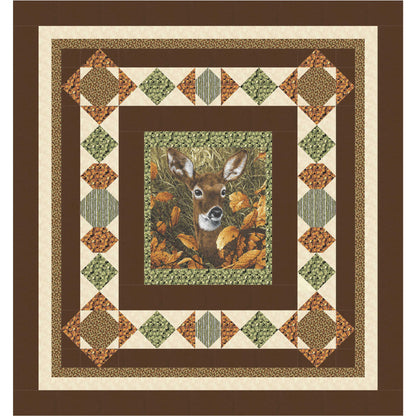Quilt with a deer design in the center, surrounded by geometric patterns on a brown background