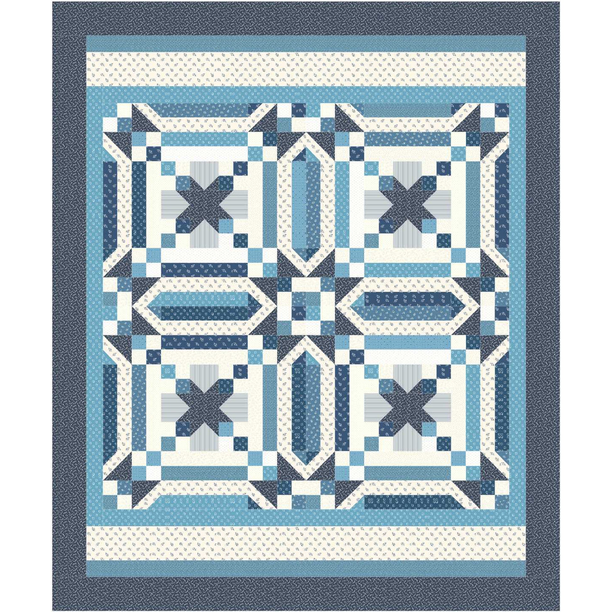 Quilt with blue and white geometric pattern on a white background