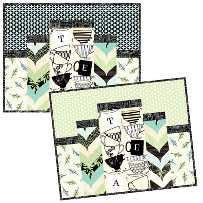 Two placemats with tea-themed designs on a white background