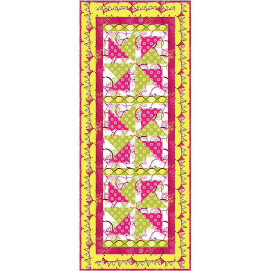 Quilt with colorful geometric table runner pattern on a white background