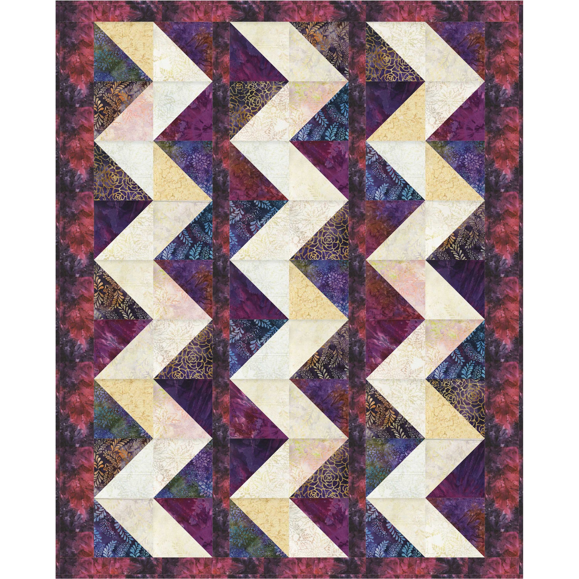 Quilt with chevron pattern in purple, beige, and multicolor fabric on a white background