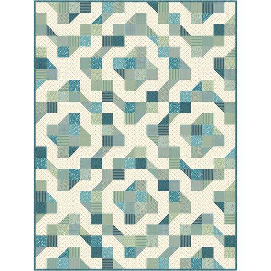 Geometric patterned rug with blue and green colors on a white background