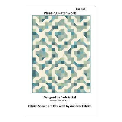 Patterned fabric swatch with geometric design in blue and green on a white background, labeled 'Pleasing Patchwork' by Barb Sackel.