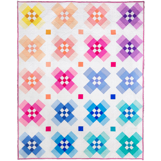 Intermediate quilt pattern with modern geometric vibe, featuring color gradation from light to dark. Ideal for fat quarters, precuts, and scraps.