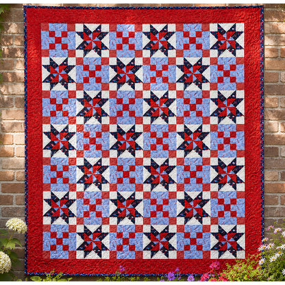 Celebrate America, summer picnics and the Fourth of July with this fun quilt featuring Sawtooth Stars, Pinwheels and Chain blocks! Beautiful quilt in red, white and blue fabric!  